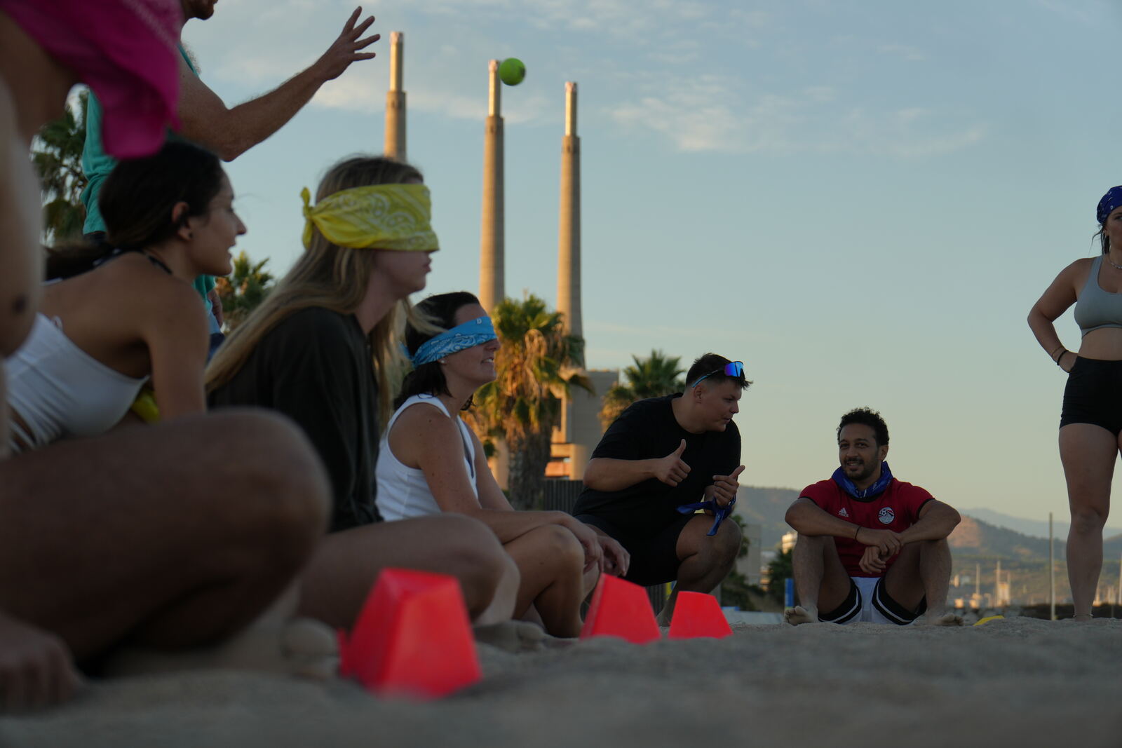 Teammates calling directions to a blindfolded player mid-game